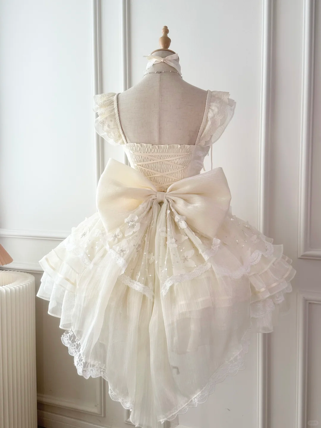 Elegant Cream Lace Ruffled Maid Dress with Pink Bow Accents