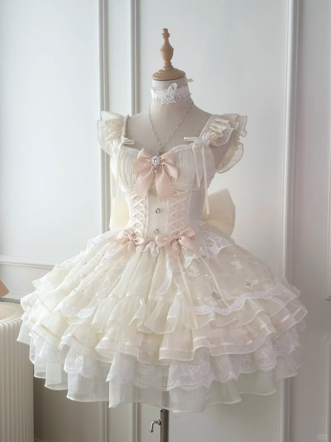 Elegant Cream Lace Ruffled Maid Dress with Pink Bow Accents